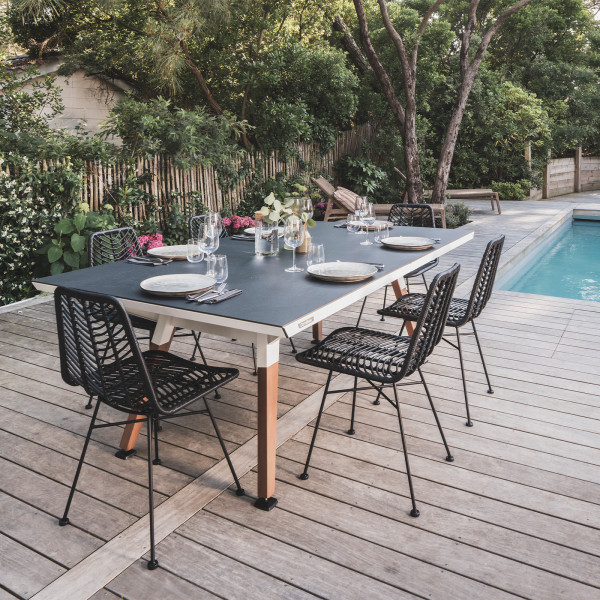 White Cornilleau Play-Style Origin Medium table set for outdoor dining by the pool