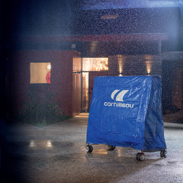Blue Cornilleau Sport table tennis table cover in use on folded table