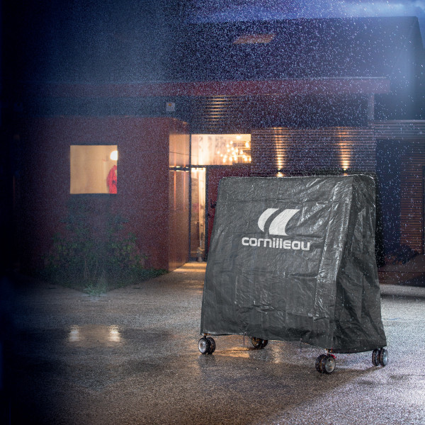 Grey Cornilleau Sport table tennis table cover in use on folded table