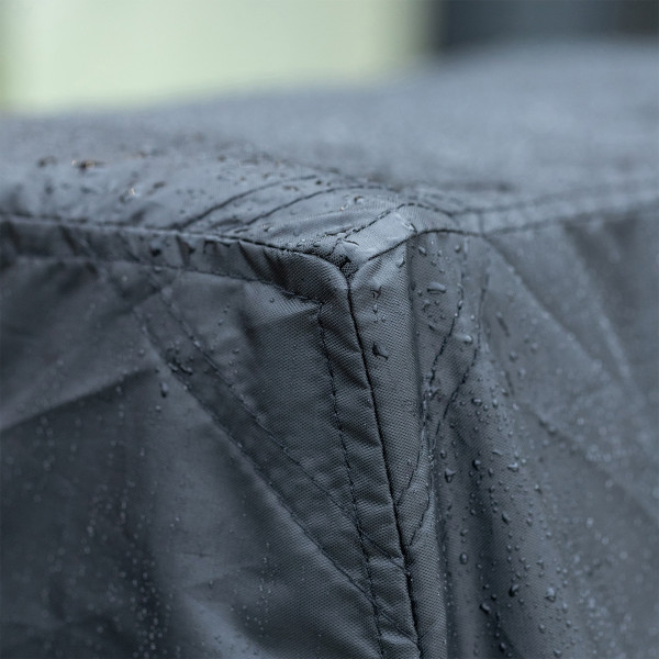 Close-up of rain droplets on Cornilleau Premium+ table tennis table cover