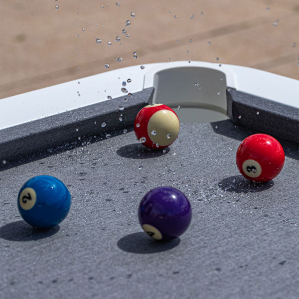 Close-up of water-resistant cloth on the Cornilleau Play-Style Hyphen outdoor pool table with white frame and light grey cloth