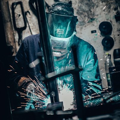 Image of a welder in the Exigo factory