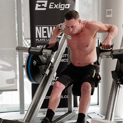 Image of a model using the Exigo Plate Loaded 2.0 ISO Bent Over Row in biometric testing.