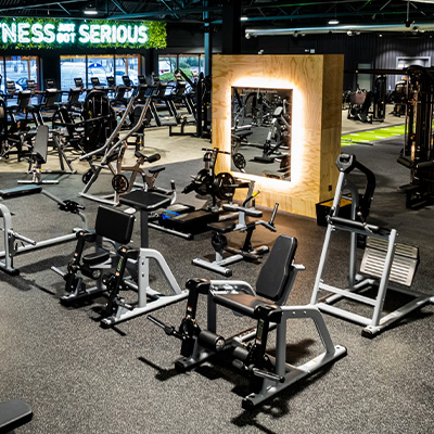 photograph of a gym setting with the Exigo Plate Loaded 2.0 ISO Leg Extension