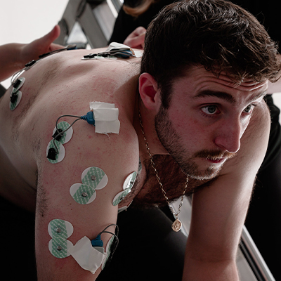 Image of a model wearing data nodes for scientific study