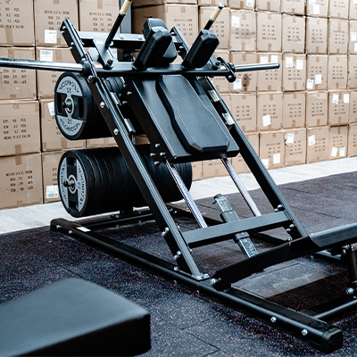 Image of the Exigo hack squat being fitted into a gym