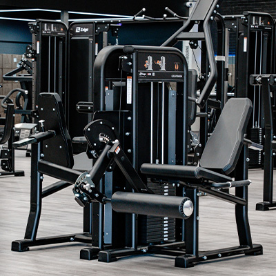 Photograph of the Exigo Leg Extension in a gym setting