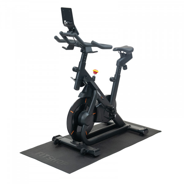 A product image of the Fitshop PVC Equipment Mat - with an exercise bike