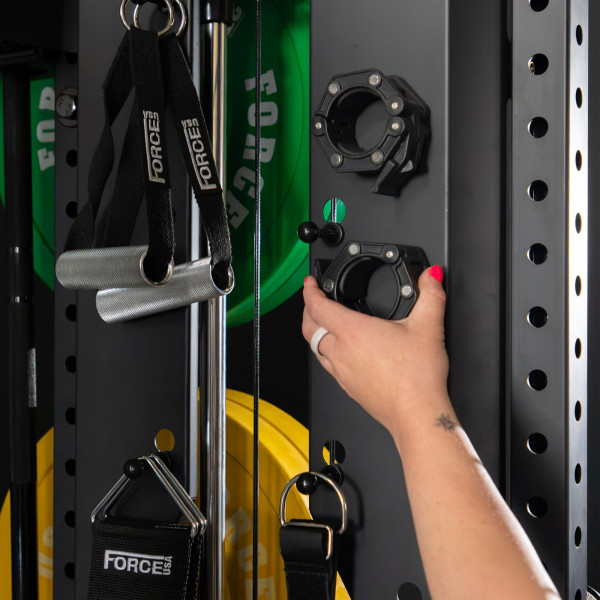 Lifestyle image of the Force USA C10 V2 Compact - Model adjusting attachments