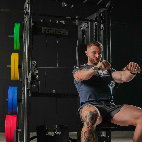 Lifestyle image of the Force USA C10 V2 Compact - Model performing cable chest press