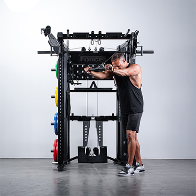 User performing cable tricep pushdown on Force USA C20 Trainer