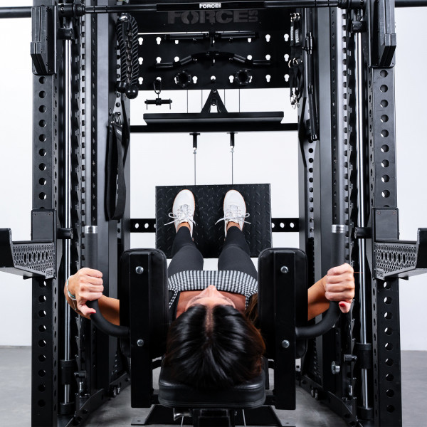 User performing leg press on Force USA C20 Trainer