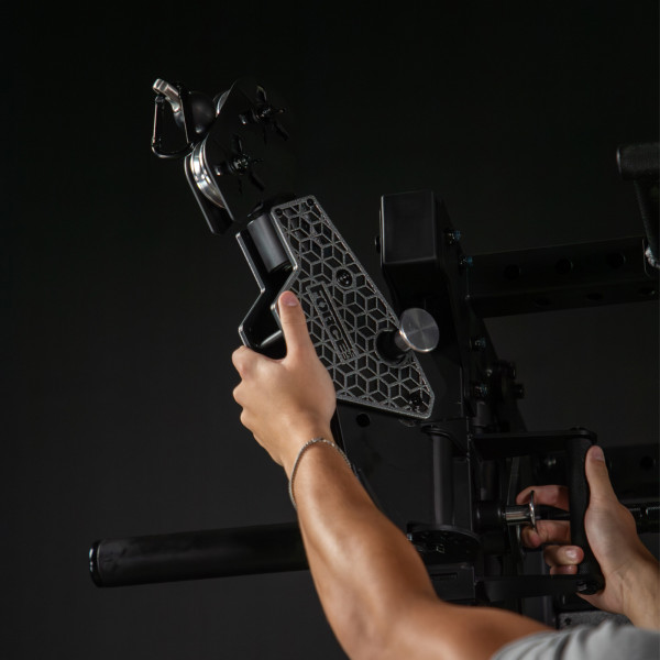 Lifestyle photograph of the Force USA M10 - Model adjusting cable pulley