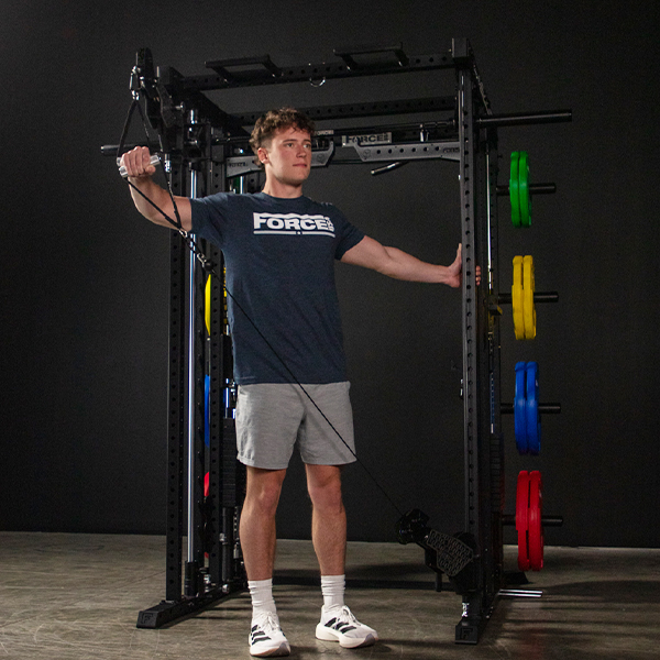 Image of the Force USA M10 fully loaded with weight plates and including the Smith bar and weight stacks.