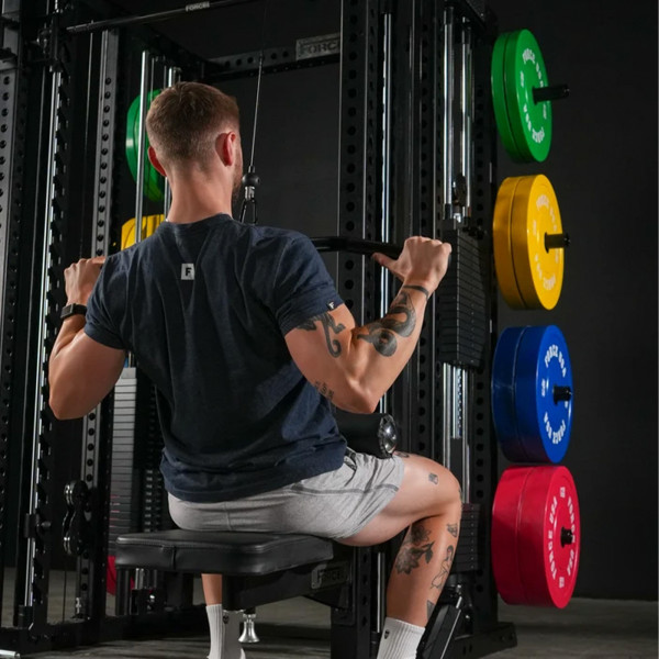 Lifestyle image of the Force USA M20 All-In-One Trainer - Image of a model performing a lat pulldown