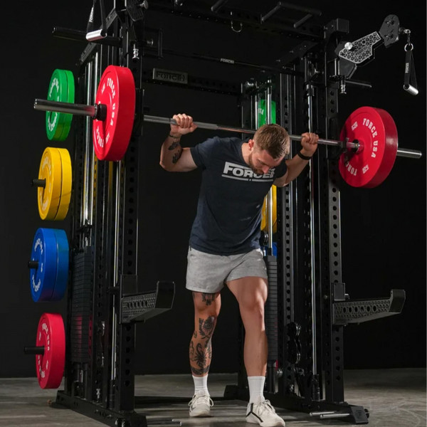 Lifestyle image of the Force USA M20 All-In-One Trainer - Image of a model performing a barbell squat