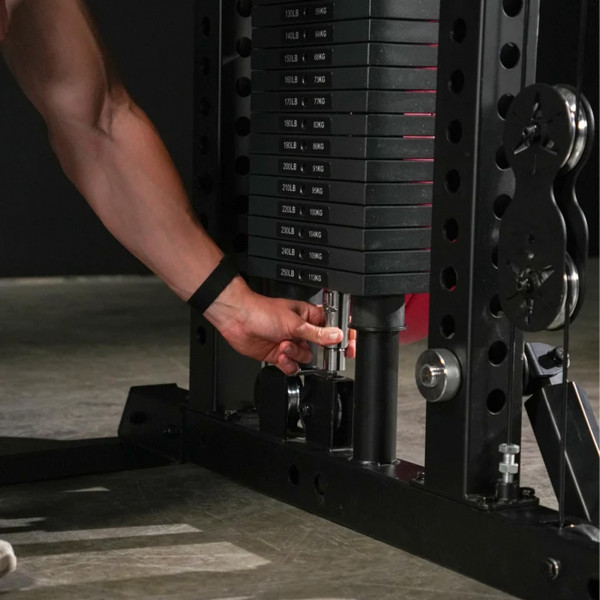 Lifestyle image of the Force USA M20 All-In-One Trainer - Image of a model using the Twist Lock mechanism