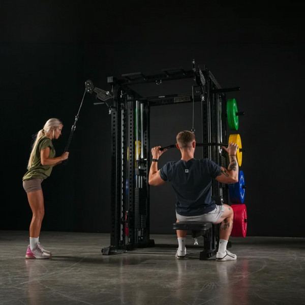 Lifestyle image of the Force USA M20 All-In-One Trainer - Image of a pair of models working out together