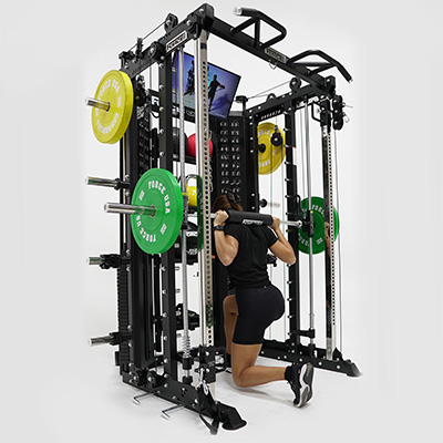 Model using jammer arms on the Force USA G15 All-In-One Trainer 