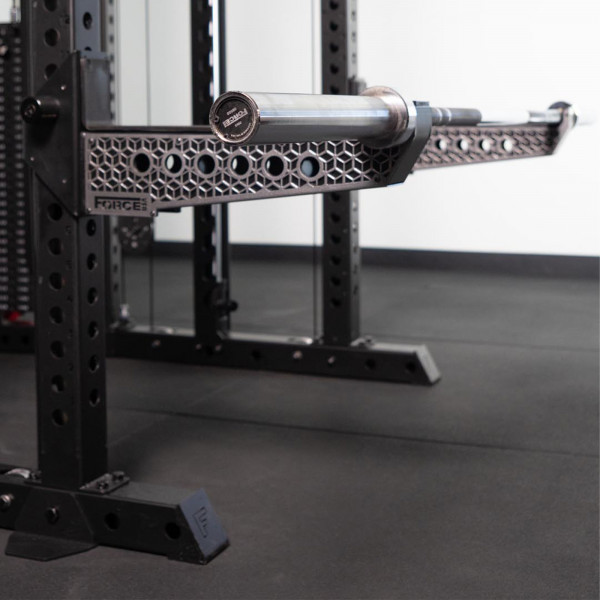 Force USA Spotter Arms mounted on rack with barbell