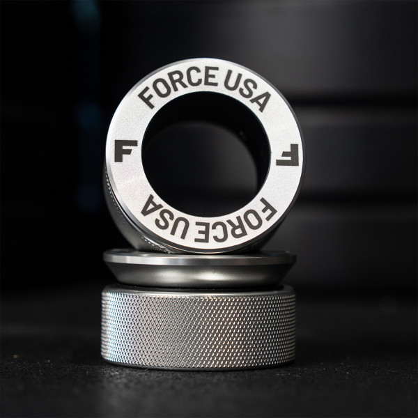 Stacked view of the silver Force USA Xcalibur Olympic Collars