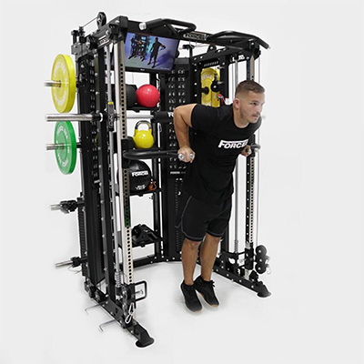 Model performing dips on the Force USA G15 All-In-One Trainer