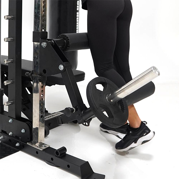 ForceUSA G Series Leg Extension used by a women