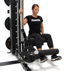 A women working out with ForceUSA G Series Leg Extension and Curl Attachment 