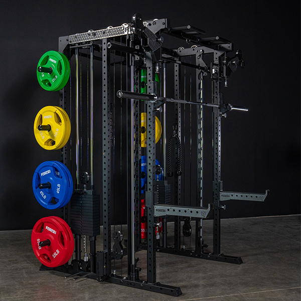 Image of the Force USA M10 fully loaded with weight plates and including the Smith bar and weight stacks.