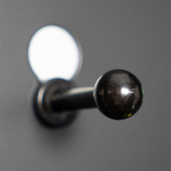 A close-up image of the Force USA Pegboard Pins inserted into the pegboard