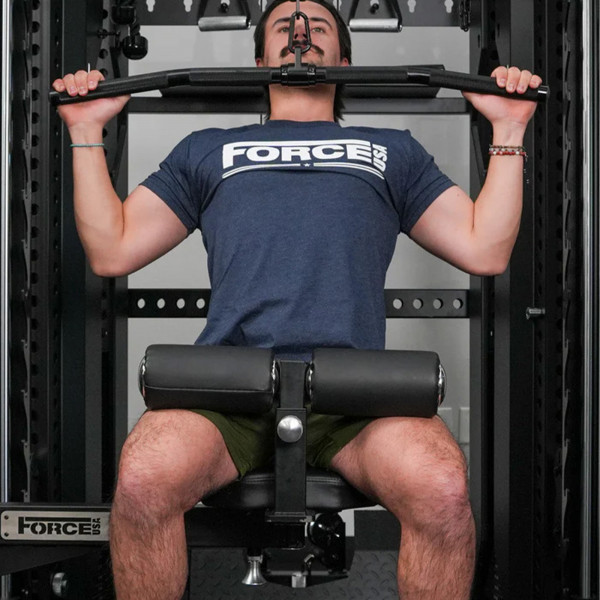 User performing lat pulldown on the Force USA Swivel Seat (front view)
