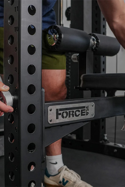 Close-up of the Force USA Swivel Seat mounting pin on upright