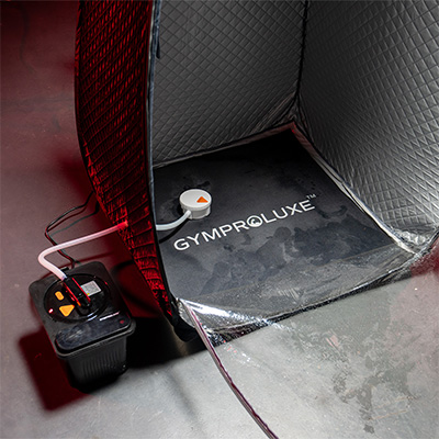Lifestyle image of the GymProLuxe Tropical Sauna Pod opened up to show the steam delivery system