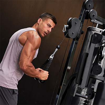 Image of a model performing tricep pulldown on the HAMMER Autark 2200 Multi-Gym