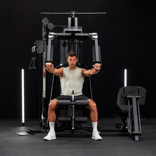 Lifestyle image of the HAMMER Autark 2500 Multi-Gym - Model performing chest press