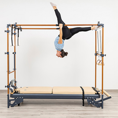 Hanging split using upper bars on the HEGREN TALMA 62CR Cadillac Reformer