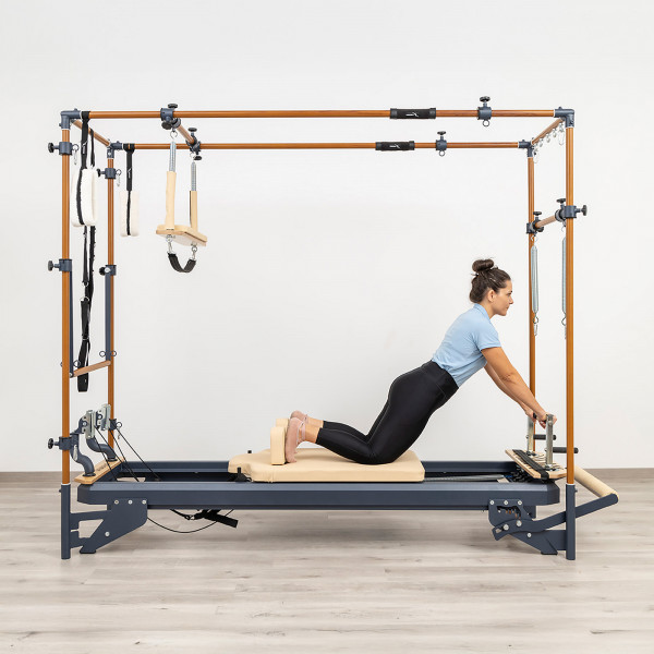 Kneeling reformer work using footbar on the HEGREN TALMA 62CR Cadillac Reformer