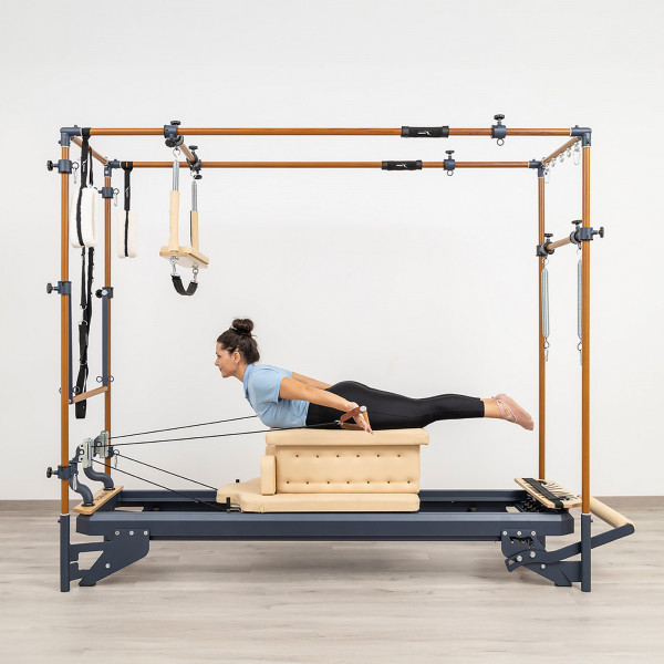 Swan exercise on long box with straps on the HEGREN TALMA 62CR Cadillac Reformer