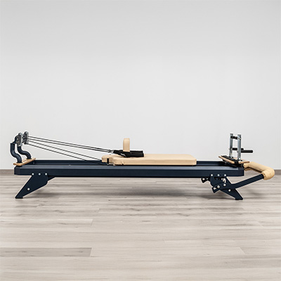 Side view of the HEGREN TALMA 62 Pilates Reformer