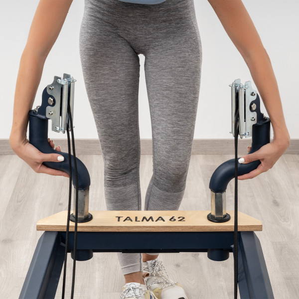 User adjusting the HEGREN TALMA 62 rope arms