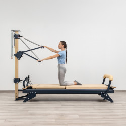 Arm spring work on the HEGREN TALMA 62CT Convertible Tower – Reformer-Mounted