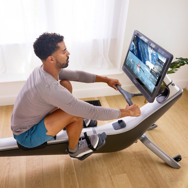 User in a high-intensity session on the Hydrow Pro Rower.