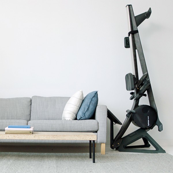 Hydrow Wave Rower folded in a living room.