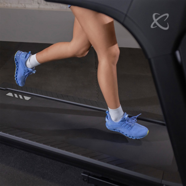 Close-up of user’s feet on the Inspire Fitness Series T5 Treadmill belt