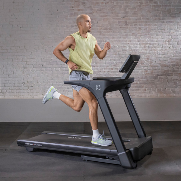 User running on the Inspire Fitness Series T5S Treadmill