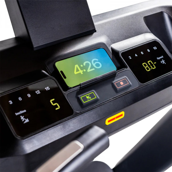 Close-up of the Inspire Fitness Series T7 Treadmill quick controls and phone slot
