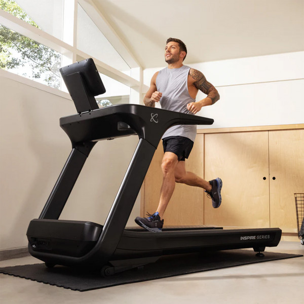 Front view of the Inspire Fitness Series T7S Treadmill during a workout
