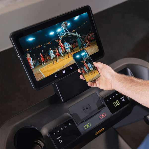 Smartphone screen mirrored to the Inspire Fitness Series T7S Treadmill console
