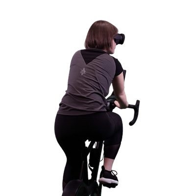 Model cycling indoors while wearing a virtual reality headset 