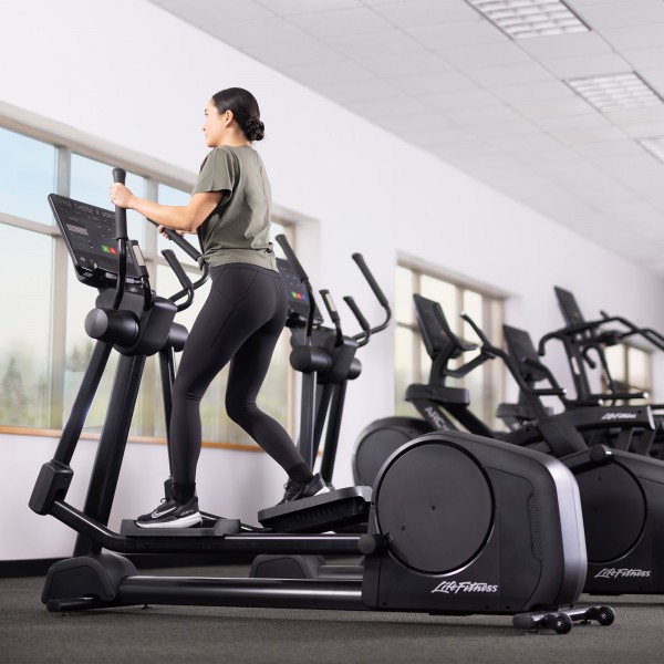 Exerciser on Life Fitness Aspire Cross Trainer demonstrating usage